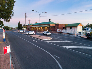Road, bus stop and train station showing public transport infrastructure