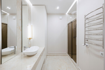 Naklejka na ściany i meble water sink with mirror and lighting in the bathroom