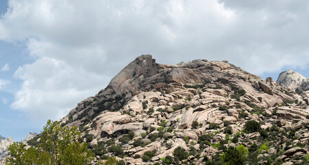 Views of the Sirio Peak, La Pedriza, from the recreational area of Cantocochino, Guadarrama Mountains National Park, Madrid, Spain