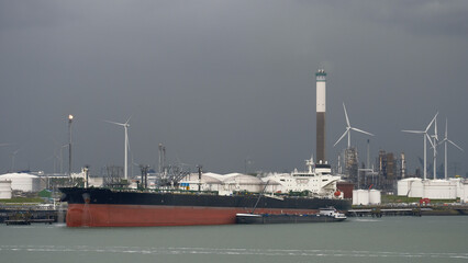 Rotterdam, Netherlands - 09 25 2022: Large oil tanker during cargo operations in the port © I am from Mykolayiv