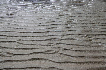 Wet abstract sand pattern for background