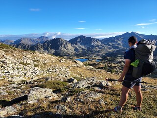 hiker backpacking in the mountains