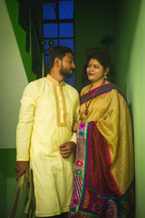 Fototapeta premium South asian hindu religious newly married young couple having post wedding chill . 