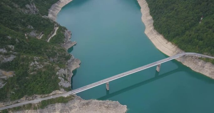 Amaizing turquoise water in Piva Lake in Durmitor National Park. Iconic place of Montenegro nature. 4k resolution, travel video content.