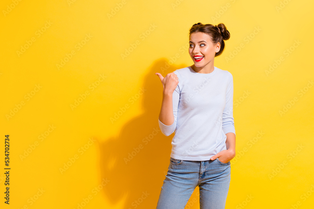 Wall mural photo of positive shocked lady find incredible promo point empty space isolated shine color backgrou