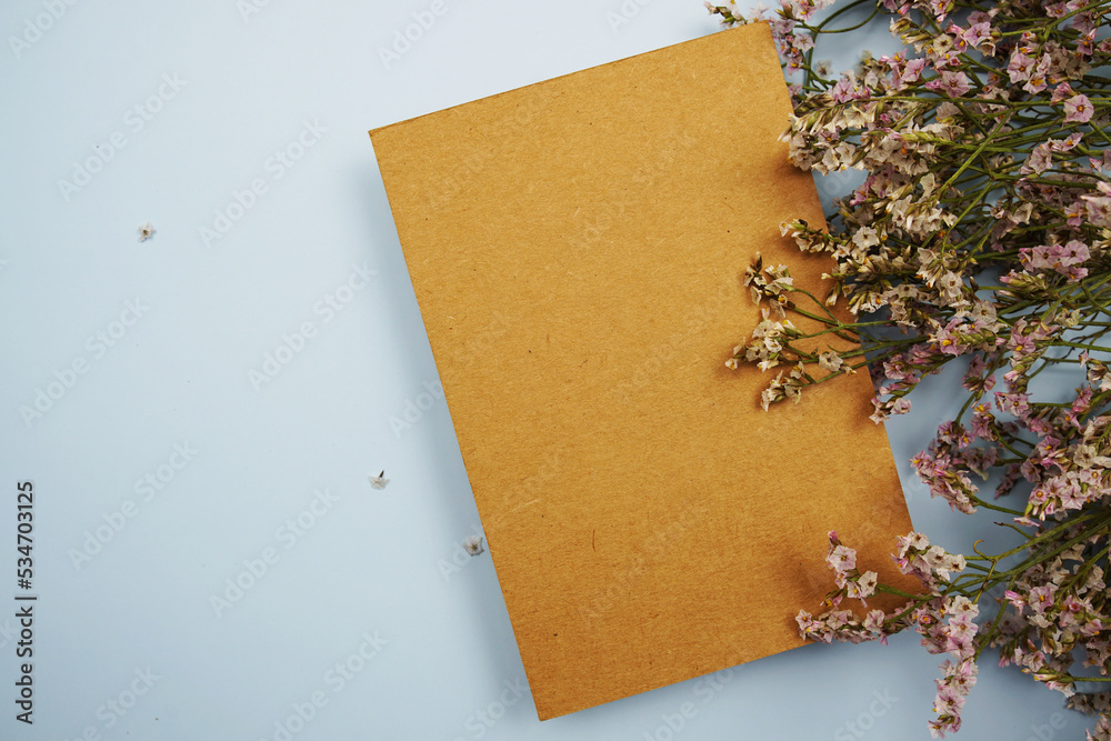 Sticker Empty card for text message and flower decoration on blue background