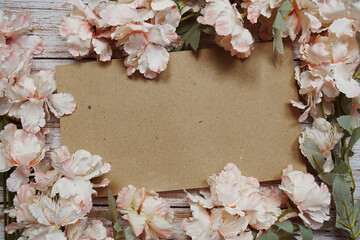 Space for copy background and flower decoration on wooden background