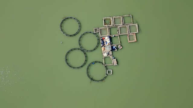 Aerial view of fish farm in Antalya Korkuteli dam lake on a sunny day