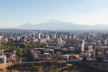 Yerevan, Armenia, beautiful super-wide angle panoramic view of Yerevan with Mount Ararat, cascade complex, mountains and scenery beyond the city, summer sunny day