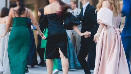 High school graduates dancing waltz and classical ball dance in dresses and suits on school prom graduation, classical ballroom dancers dancing, waltz, quadrille and polonaise - obrazy, fototapety, plakaty