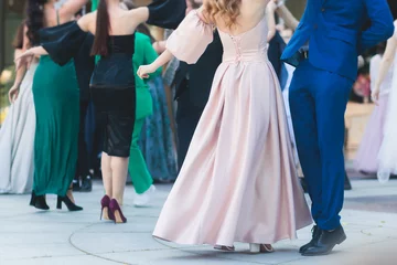 Velvet curtains Dance School High school graduates dancing waltz and classical ball dance in dresses and suits on school prom graduation, classical ballroom dancers dancing, waltz, quadrille and polonaise