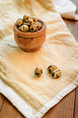 Still life with a bowl of quail eggs.