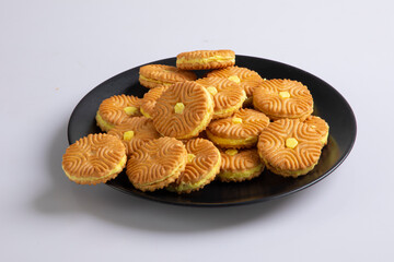 crispy, cream cookies, creamy, sweet treat, butter cookies, baked, breakfast, circle, fancy, rich, frosting, healthy, calorie, dark, junk, diet, full, group, stack, treat, eat, heap, sugary.