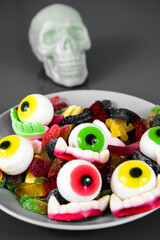 scary treats on a plate with a skull on the side to celebrate halloween 2022.