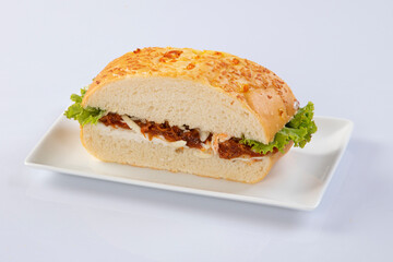 Club Sandwich with pomes salad And tomato White Plate