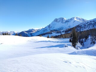 Fototapeta na wymiar winter landscape with snow on the mountains in Sella di Razzo on the Dolomites
