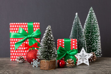 Christmas composition. craft Gift box, small tree, branches and craft DIY decorations on white background. New year concept. Christmas home decoration Flat lay, top view, copy space