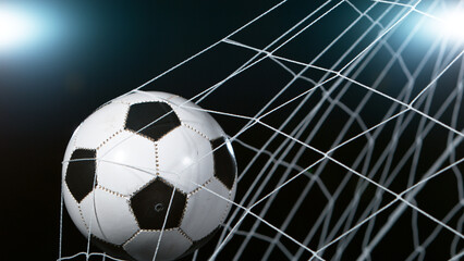 Naklejka premium Close-up of Soccer Ball Hitiing Goal Net, Close-up.