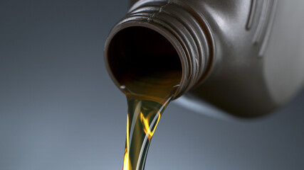 Pouring Oil from Plastic Container, Macro Shot