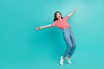 Full length photo of crazy scared lady open hand mouth falling empty space striped trendy clothes...