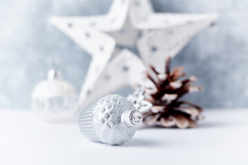 Christmas decoration. Bright wooden background. Selective focus. Close up. 