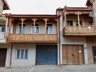 Traditional house with wooden balcony in old historical part of Telavi town, capital city of Kakheti region, Georgia.