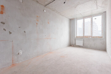 interior of the apartment without decoration in gray colors