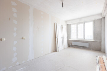 interior of the apartment without decoration in gray colors
