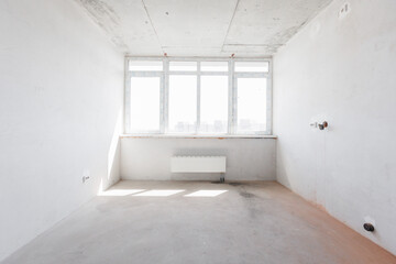 interior of the apartment without decoration in gray colors