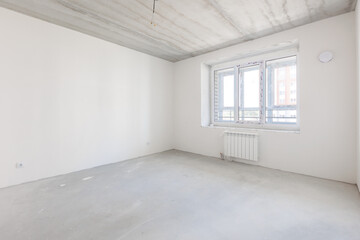 interior of the apartment without decoration in gray colors