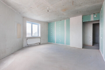 interior of the apartment without decoration in gray colors