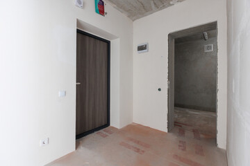 interior of the apartment without decoration in gray colors