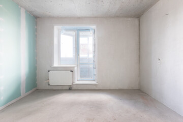 interior of the apartment without decoration in gray colors