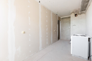 interior of the apartment without decoration in gray colors