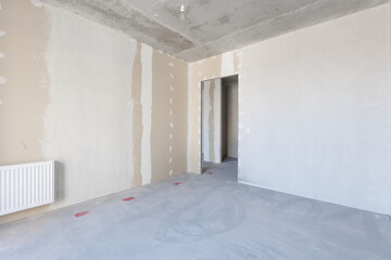 Fototapeta premium interior of the apartment without decoration in gray colors