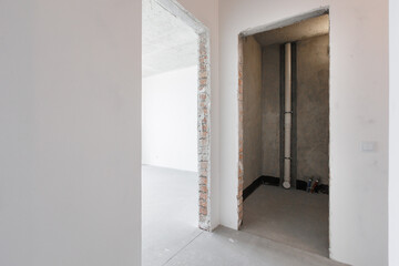 interior of the apartment without decoration in gray colors