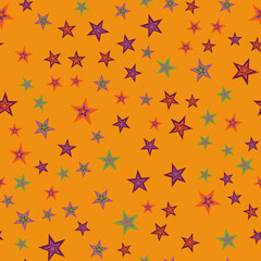 Multi-colored stars of different sizes on an orange background. Seamless vector pattern, festive texture. Illustration for children's textiles, wallpapers, postcards