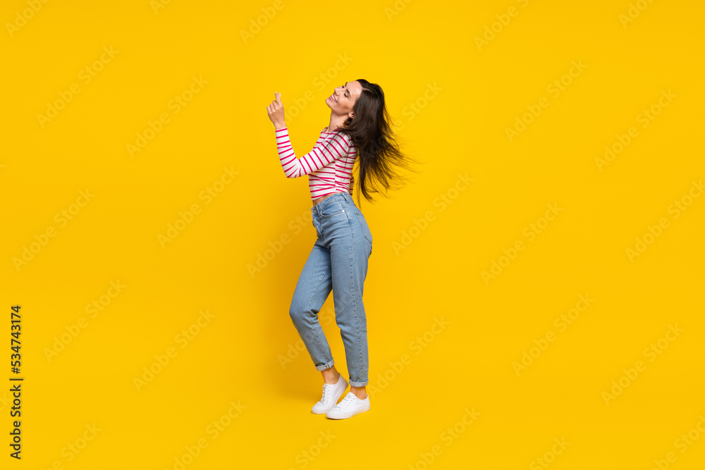 Poster Full length profile side photo of positive lady girlfriend stylish clothes time for party empty space isolated on yellow color background