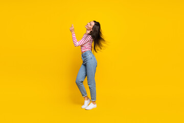 Fototapeta na wymiar Full length profile side photo of positive lady girlfriend stylish clothes time for party empty space isolated on yellow color background