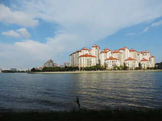 Fototapeta na wymiar HDB flats on the bank of river