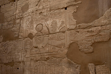 Egyptian bas-relief on the walls of an ancient temple