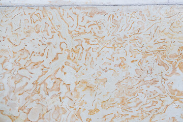 Dolomite texture. Natural rock with beautiful beige patterns on the surface. Polished flat stone. Classic luxury decoration building material. Solid stone background.