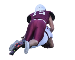 Young athletic tackle football players making great plays during a game