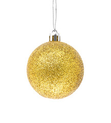 Hanging golden glitter Christmas bauble isolated on transparent background.