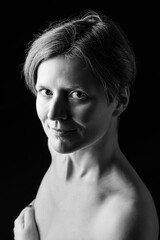 Fototapeta na wymiar Black and white portrait of a thirty year old woman