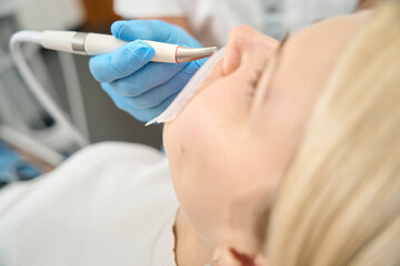 Close-up of a dental instrument during work