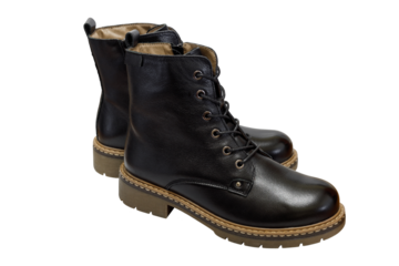 Autumn and winter women's black ankle boots with wool lining isolated on a background.