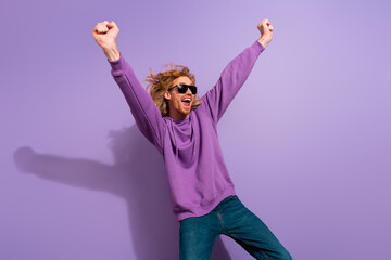 Photo of impressed beard young guy yell wear sunglass sport clothes isolated on purple color...