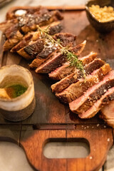 Board of grilled meat with thyme and chimichurri, Braga, Portugal
