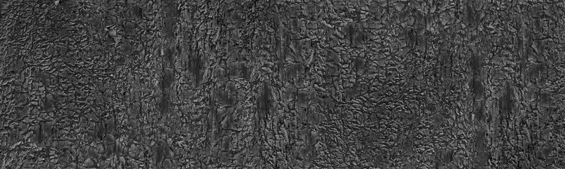 Fototapeta na wymiar Old cracked flaking peeling black paint wide texture. Abstract grunge dark panoramic background